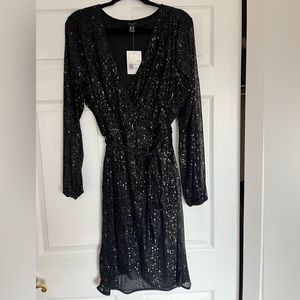 Forever 21 black sequin mini dress with tags. Size 1x